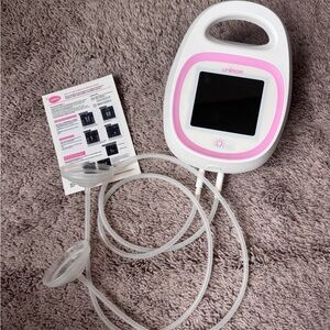 Unimom Breast Pump with Pink Accents